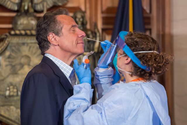 Dr. Elizabeth Dufort administers a COVID-19 test on former NY Gov. Andrew Cuomo, May 17th, 2020. Testimony from Dufort, collected during a sexual harassment probe, reveals new details about the state health department's pandemic response.